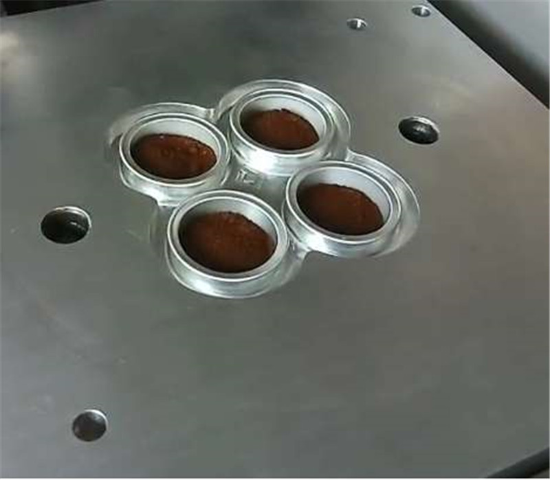 Automatic coffee capsule sealing machine