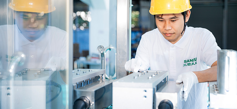 each Saneu technician is focused on creating top-grade coffee filling machines