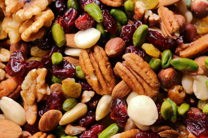 a mixture of different nuts and dried fruits for a trail mix